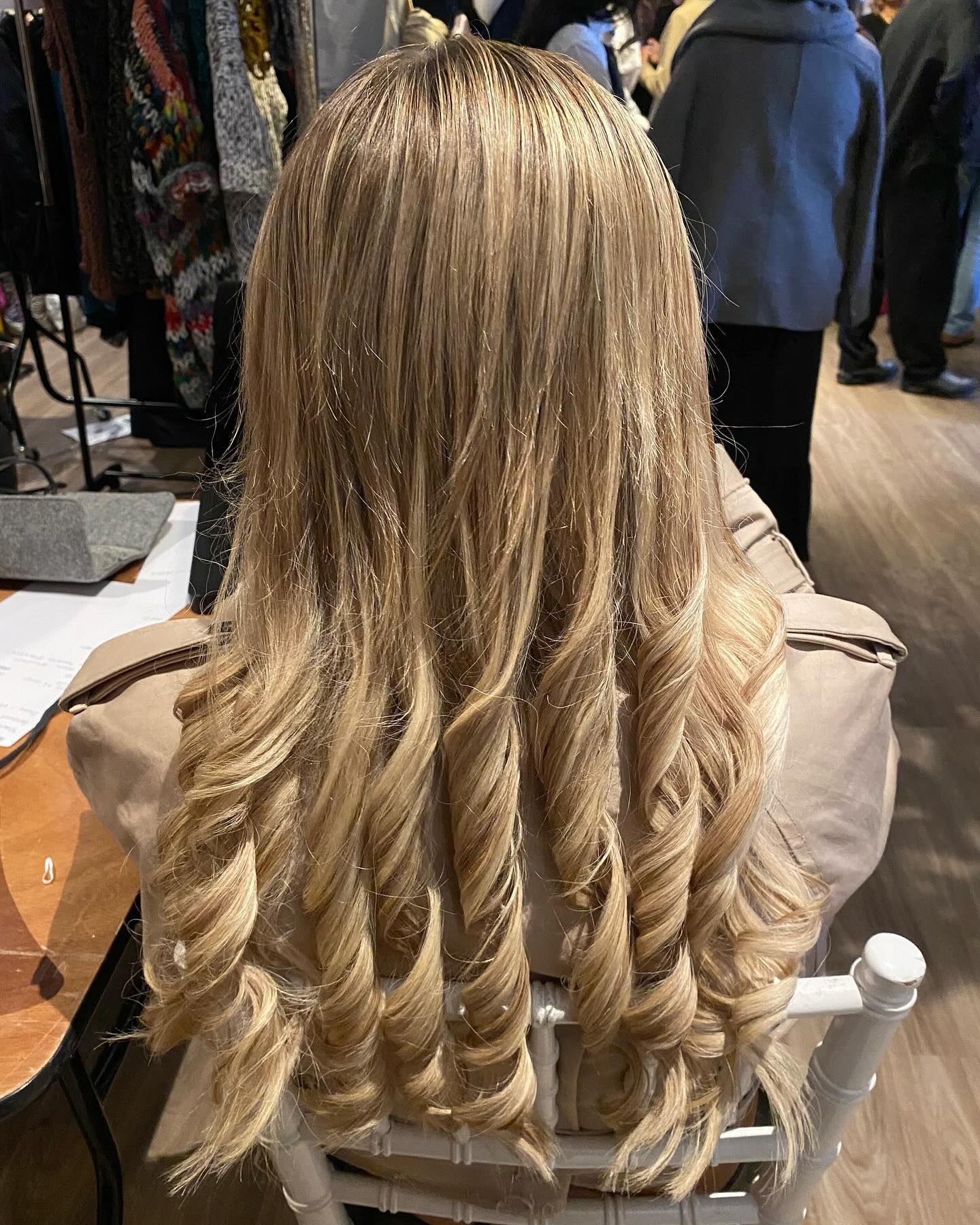 Blonde highlighted hair with bouncy curls and blowout by Hair by Sham, Leicester