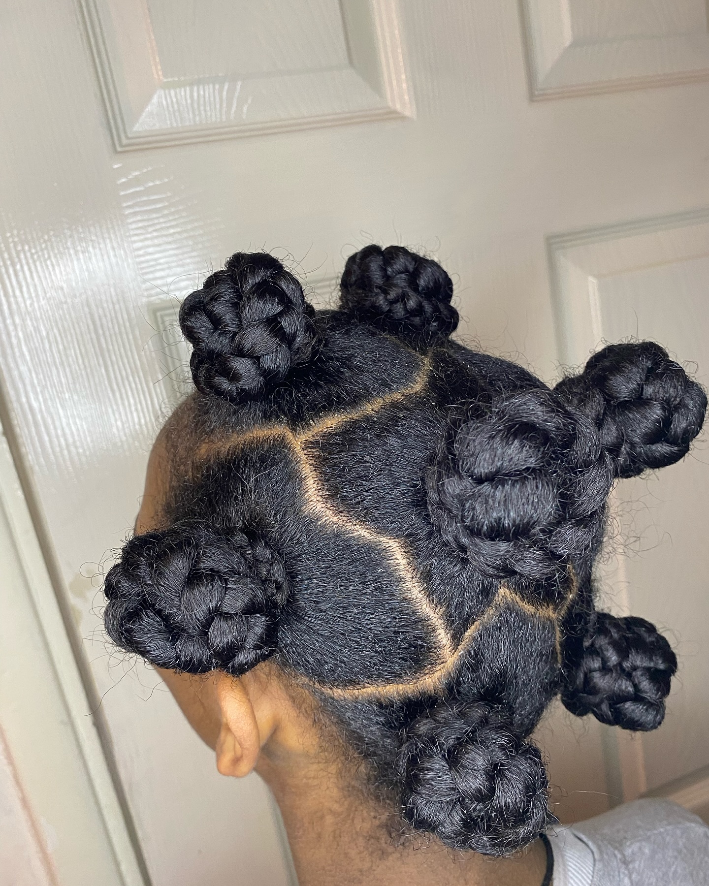 Kids braided buns protective style by Hair by Sham, Leicester
