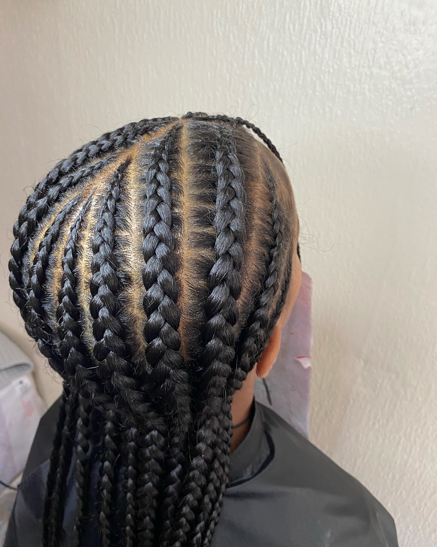Knotless box braids in jet black by Hair by Sham, Leicester