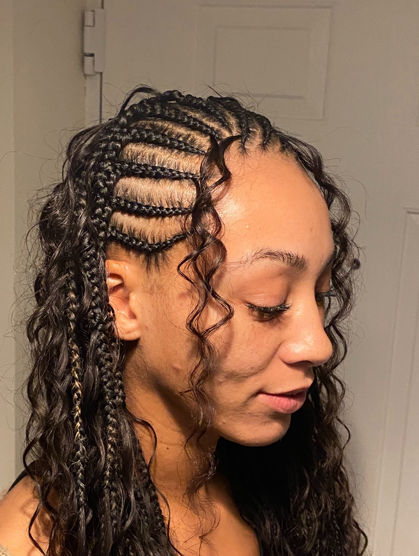 Half head cornrows with curly natural hair by Hair by Sham, Leicester